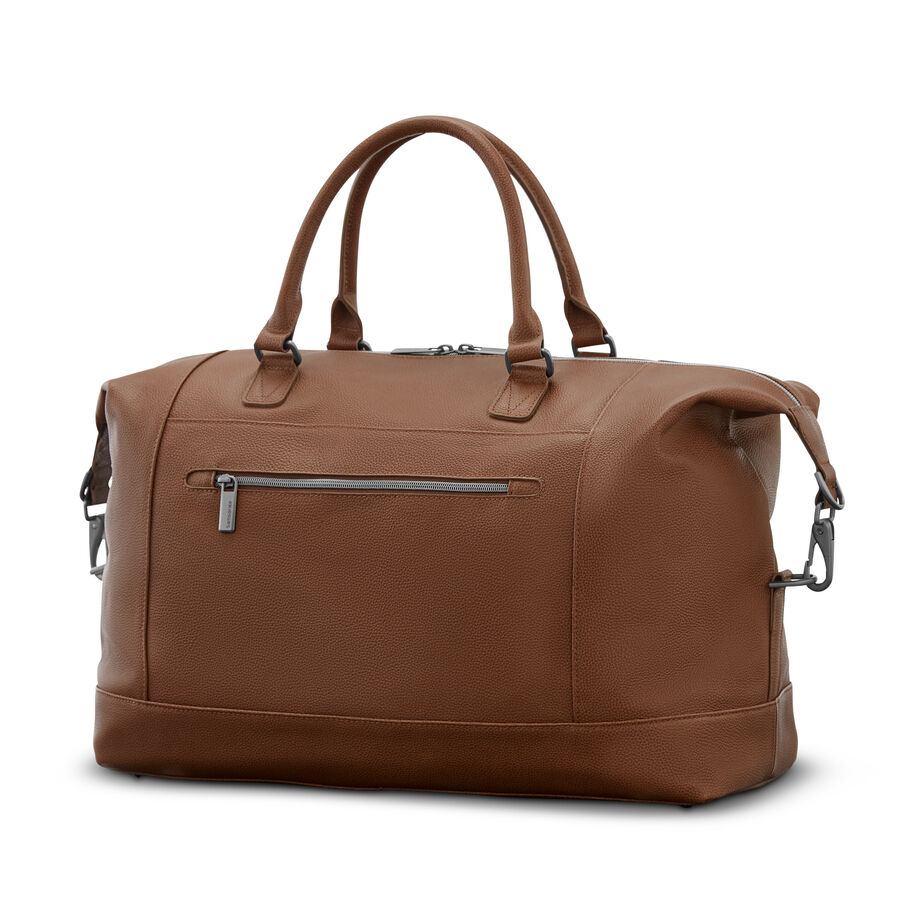 A brown leather duffel bag with handles and a front zipper pocket.