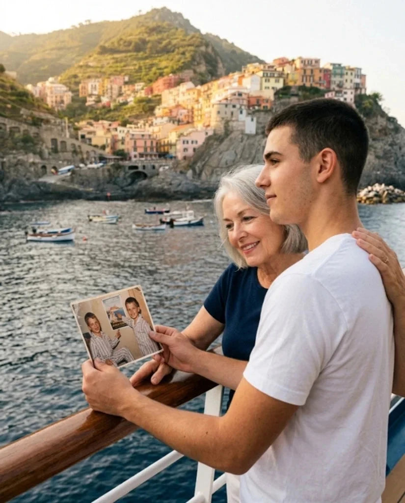 Jake and his grandmother Linda at the ship's railing, Jake holding the old photo of himself as a boy