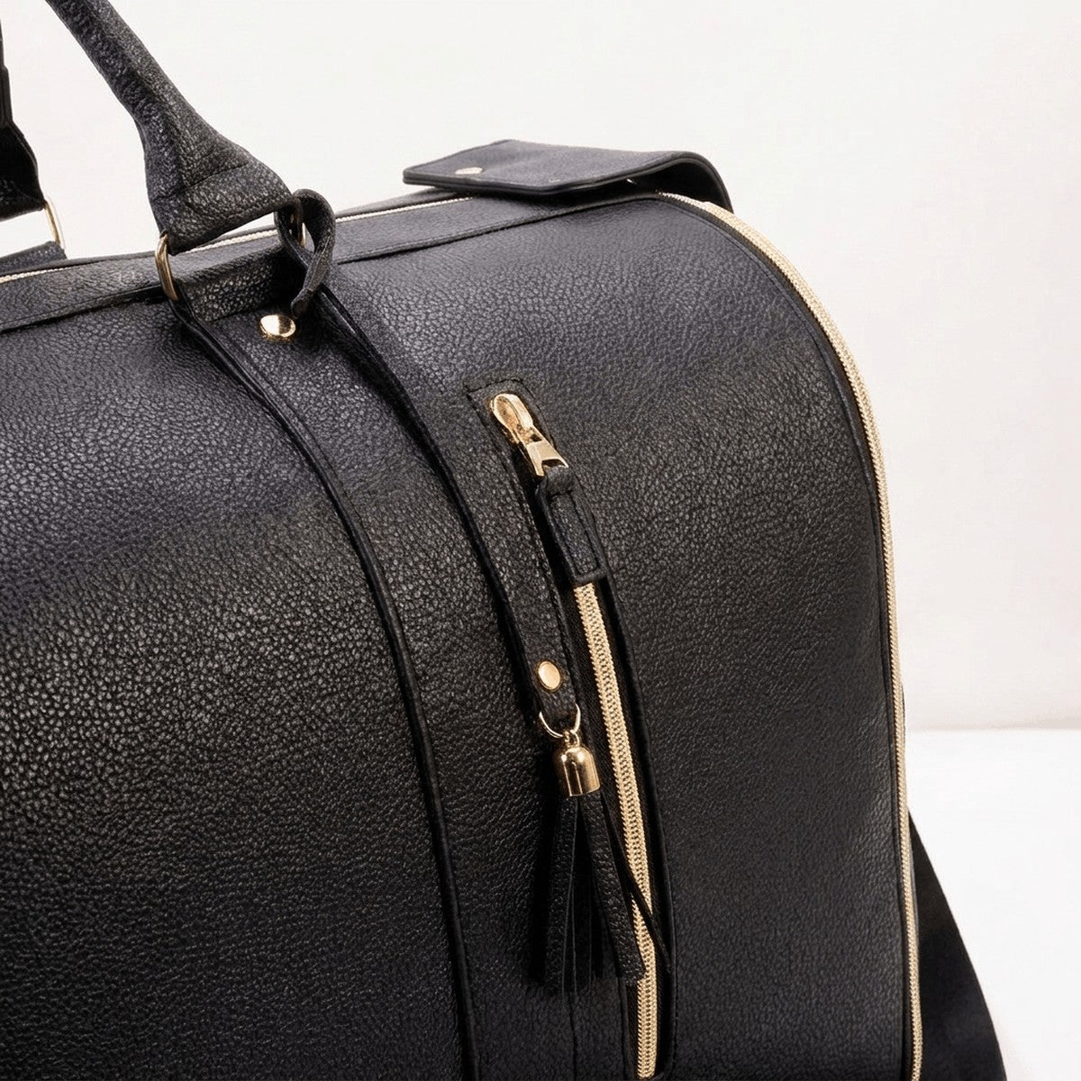 The charcoal Vohxe travel bag, sized to meet airline carry-on rules