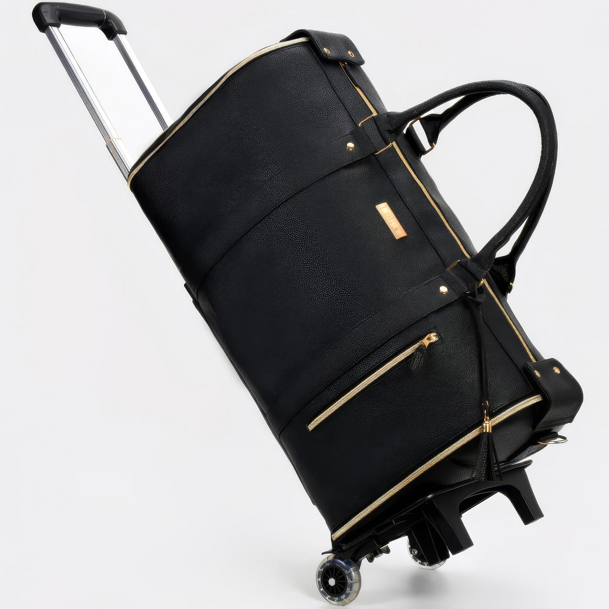 The charcoal Vohxe travel bag standing upright with its telescopic handle