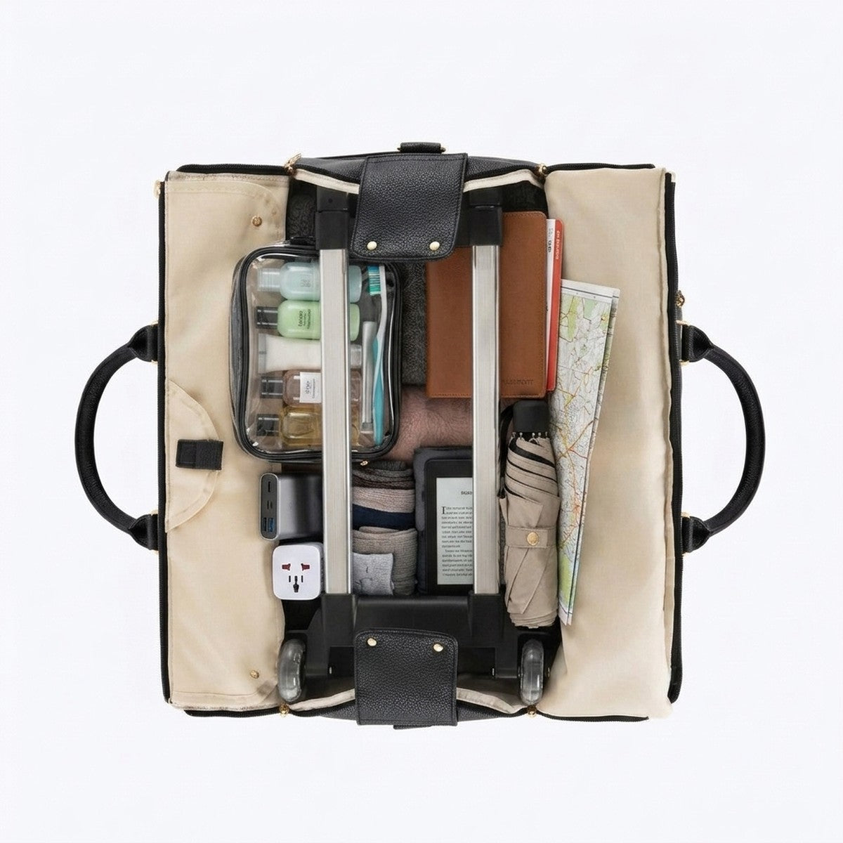 The Vohxe bag opened flat, showing the garment section and packed compartments